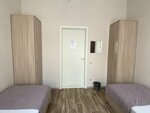 Односпальная кровать в общем номере для женщин в Happy House