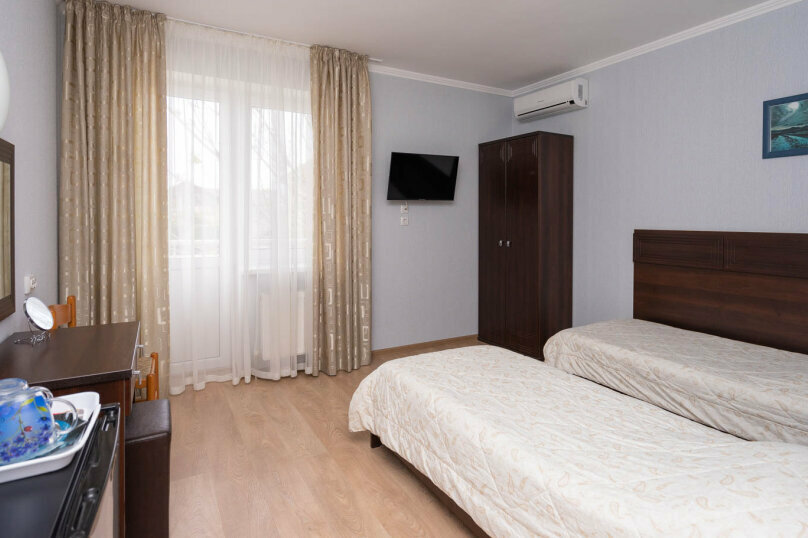 Двухместный номер с 1 кроватью или 2 отдельными кроватями и балконом