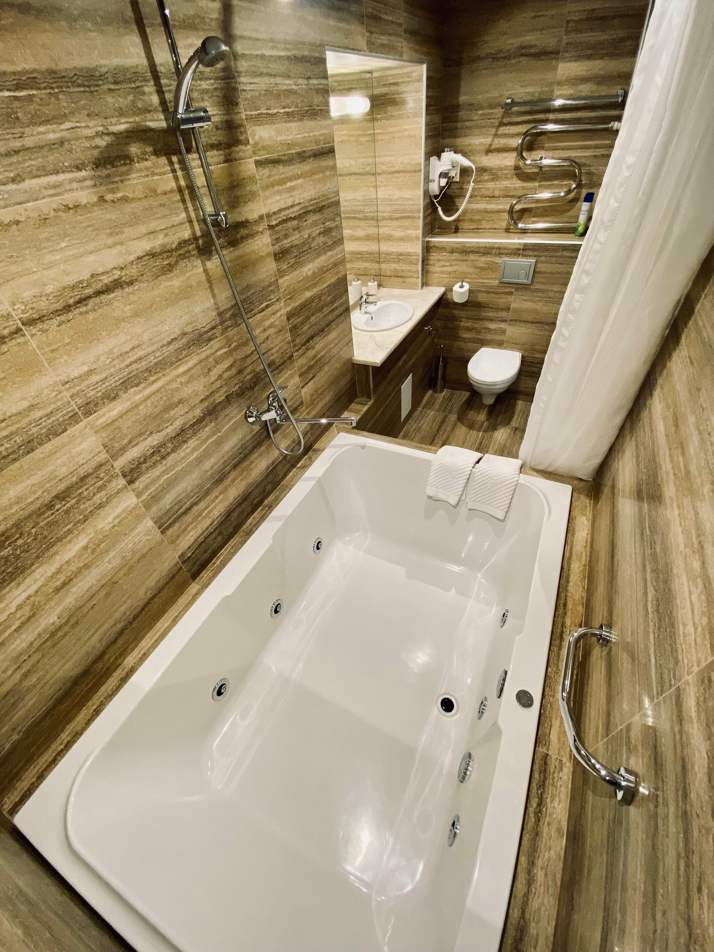 Двухместный номер Делюкс с 1 кроватью или 2 отдельными кроватями и гидромассажной ванной