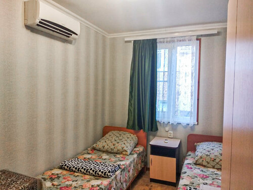 Двухместный номер с 2 отдельными кроватями и ванной в У Ирины