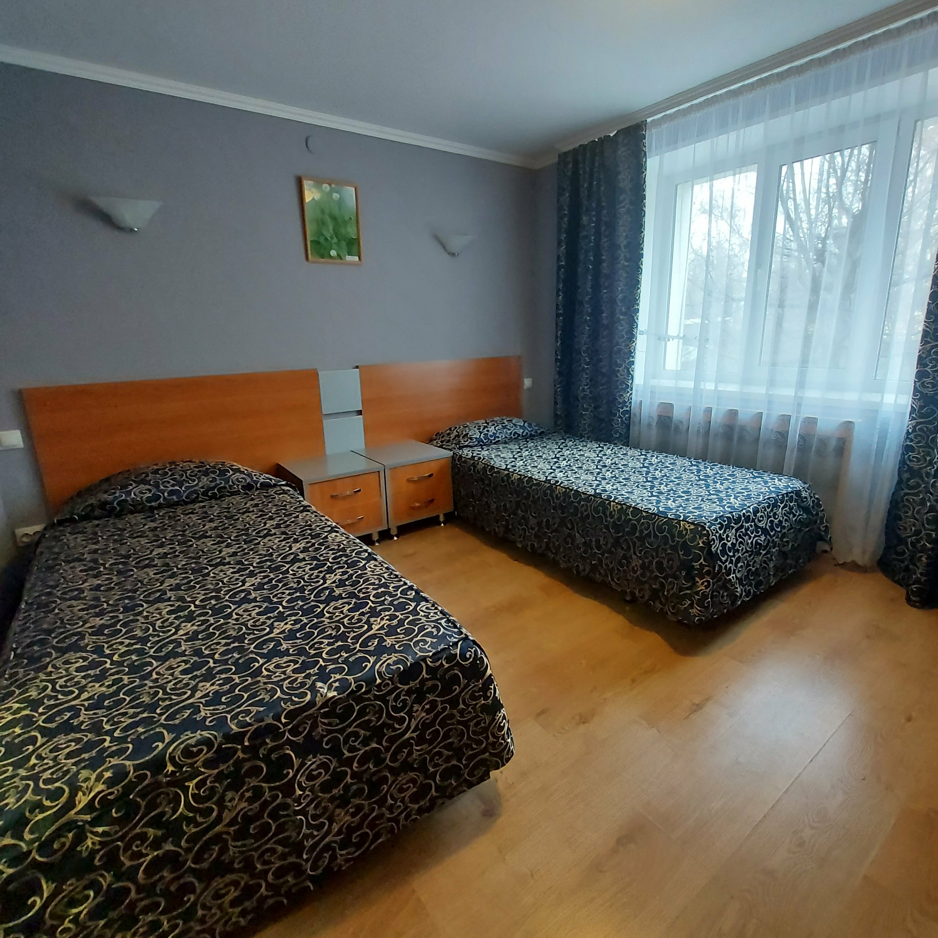 Двухместный номер с 2 отдельными кроватями и душем