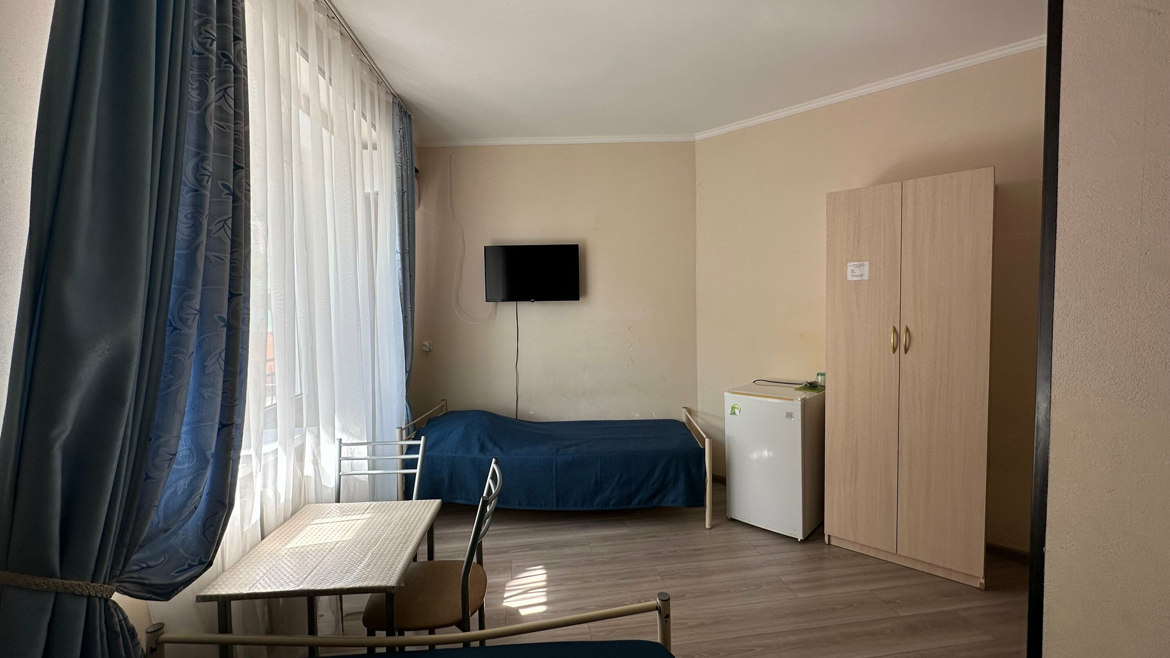 Трехместный номер с балконом