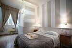 Четырехместный номер «Джуниор» в Residenza Centro Storico