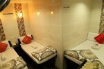 Номер (Triple Bed Room -Double & Single Bed) в Australian Guest House