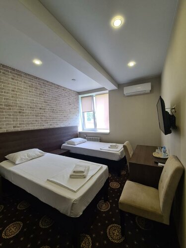 Улучшенный двухместный номер с 2 отдельными кроватями