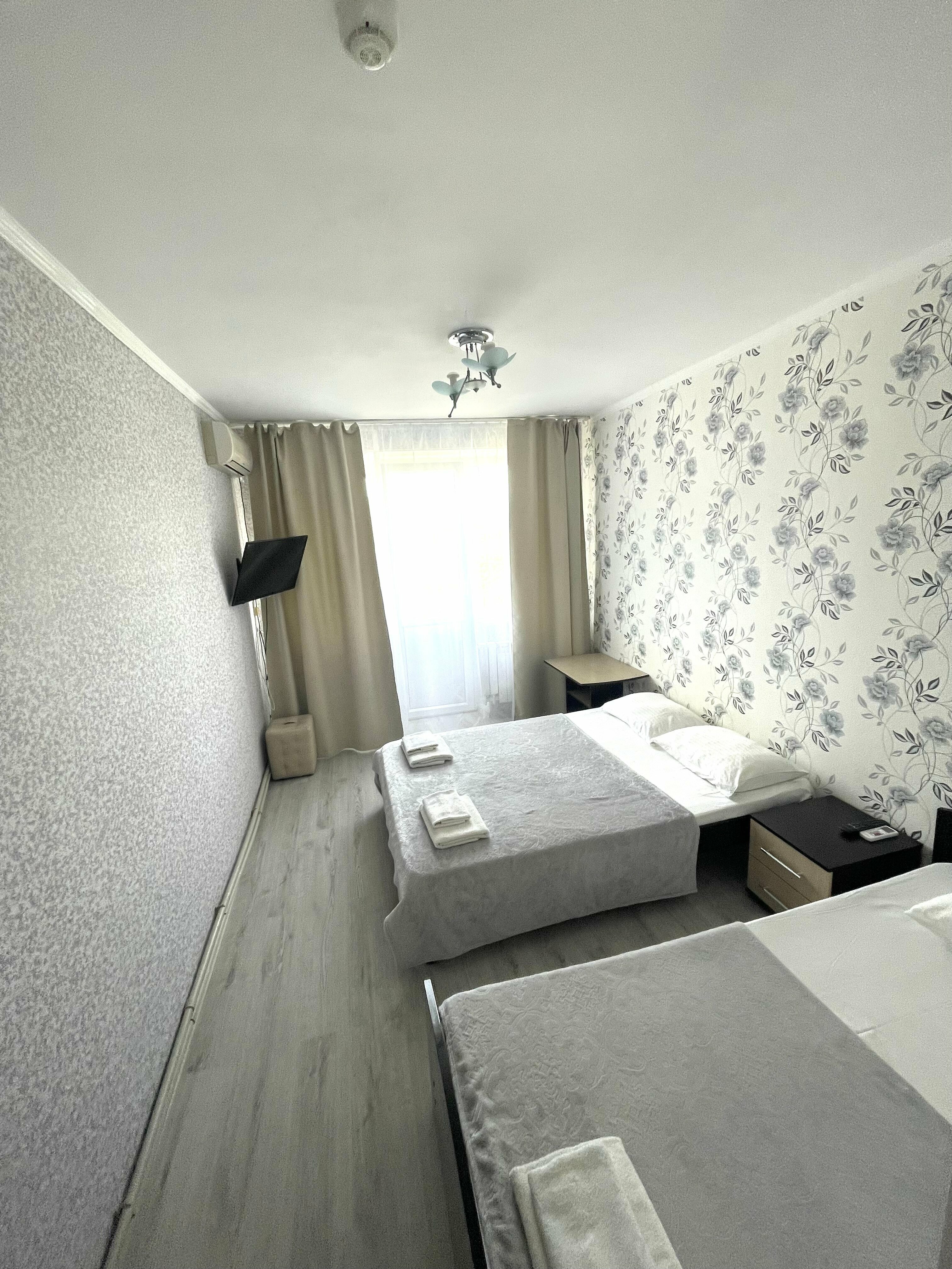 Трехместный номер с балконом