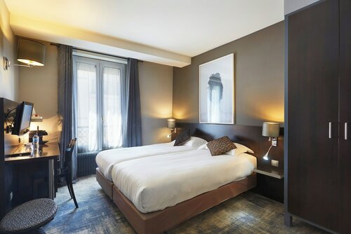 Номер с 2 односпальными кроватями в Hotel Jardin de Villiers