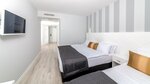 Стандартный трехместный номер в Motto Premium Hotel & SPA