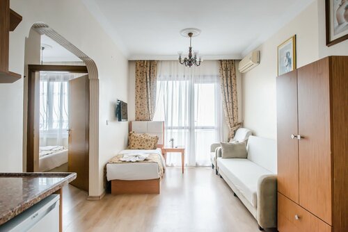 Апартаменты в Camelot Apartment