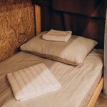 Кровать в 6-местном женском номере с 2 двухъярусными кроватями и 2 одноярусными (общие удобства) в Loft