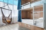 Кровать в 10-и местном общем номере повышенной комфортности в Roomy Hostel