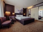 номер ЛЮКС двухкомнатный, с 1 двуспальной кроватью в DoubleTree by Hilton Moscow - Marina Hotel