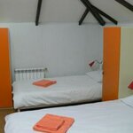 Кровать в 4-местном общем женском номере (мансарда) в Белый Тополь