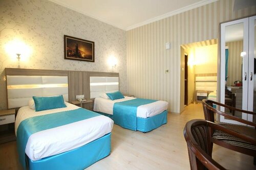 Трёхместный семейный номер Standard в Nil Hotel
