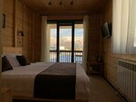 Стандартный двухместный номер с 1 кроватью или 2 отдельными кроватями и балконом в Эко-отель Альтаир