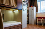 Кровать в общем 6-местном номере для мужчин и женщин в Hotel Loft Ptz