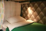 Кровать в общем 8-местном номере для мужчин и женщин в HDhostel