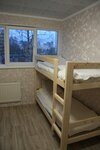 Спальное место на двухъярусной кровати в общем номере для мужчин в Северный Мишка