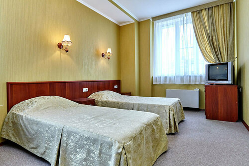 Двухместный номер с 2 отдельными кроватями и общей ванной комнатой