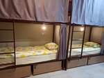 Спальное место на двухъярусной кровати в общем номере для женщин в Hostel Svet