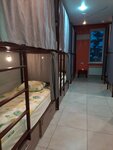 Спальное место на двухъярусной кровати в общем номере для женщин в Hostel Svet