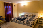 Улучшенный номер с кроватью размера «king-size» или 2 отдельными кроватями в Гостевой дом Марусин луг 18