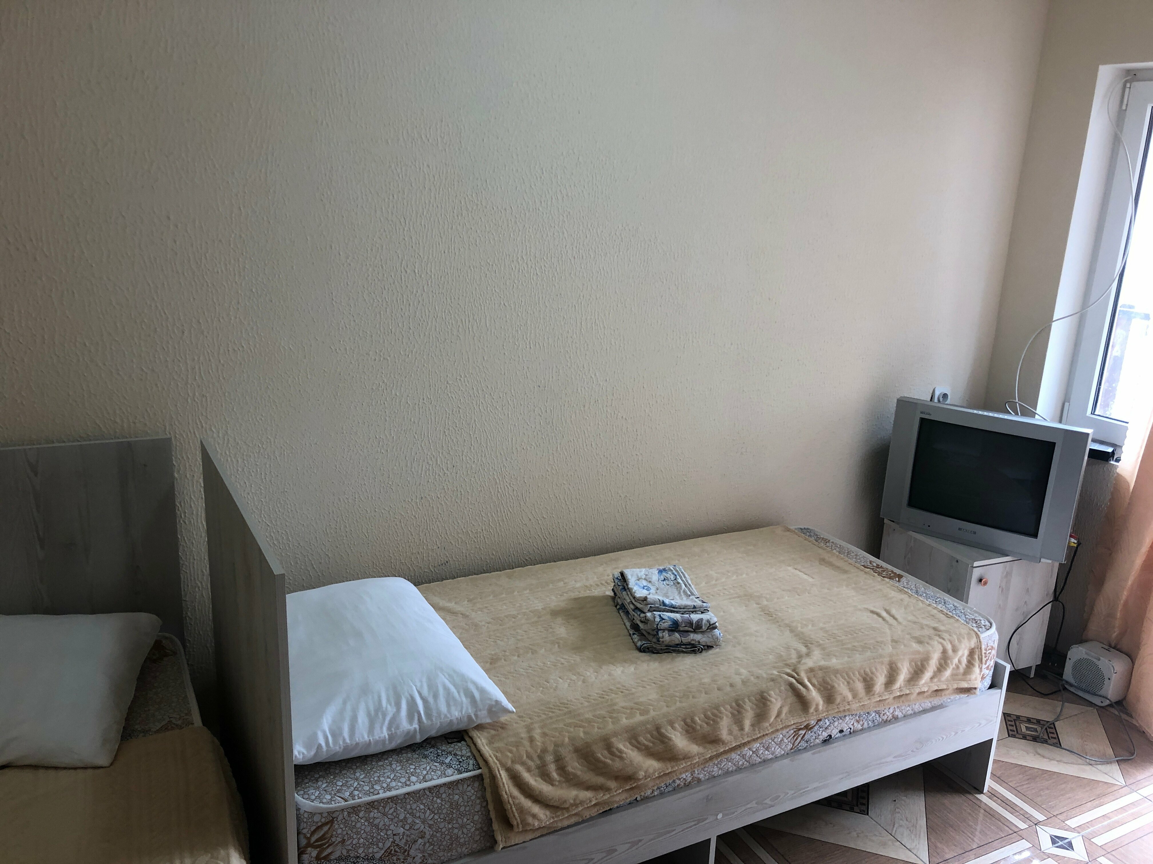 Четырехместный номер с душем