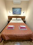 Двухместный стандарт с двуспальной кроватью с доп местом (окно выходит в атриум отеля) в Атриум