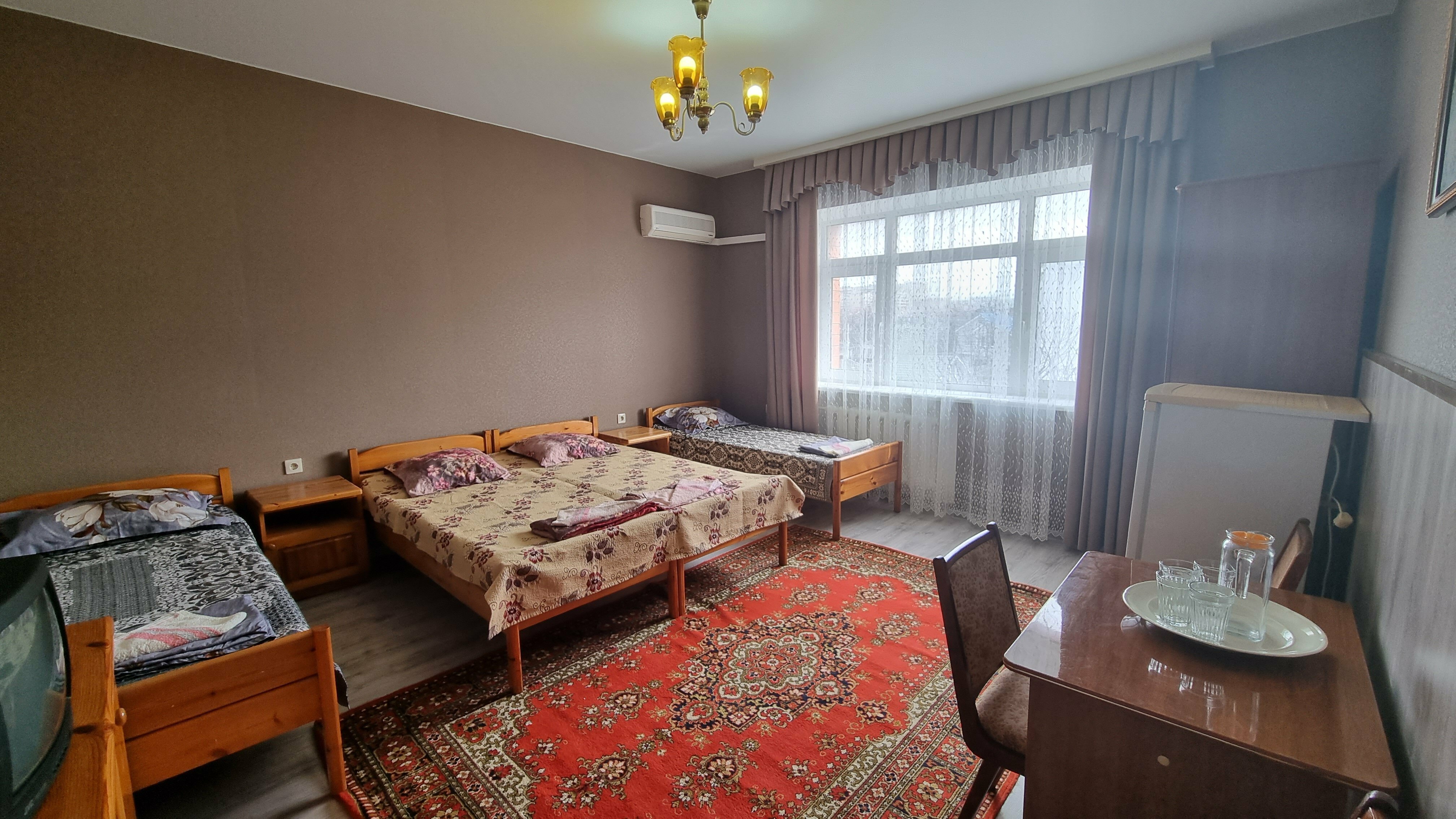 Улучшенный четырехместный номер