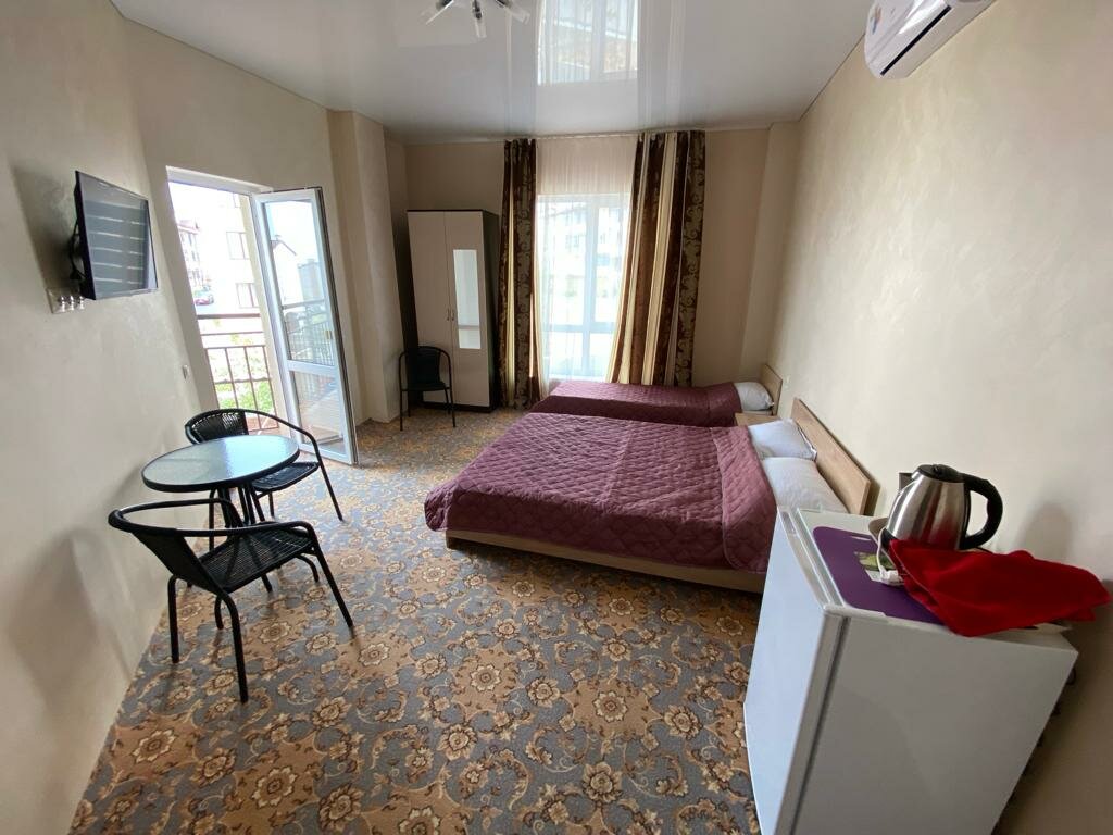 Трехместный номер Делюкс