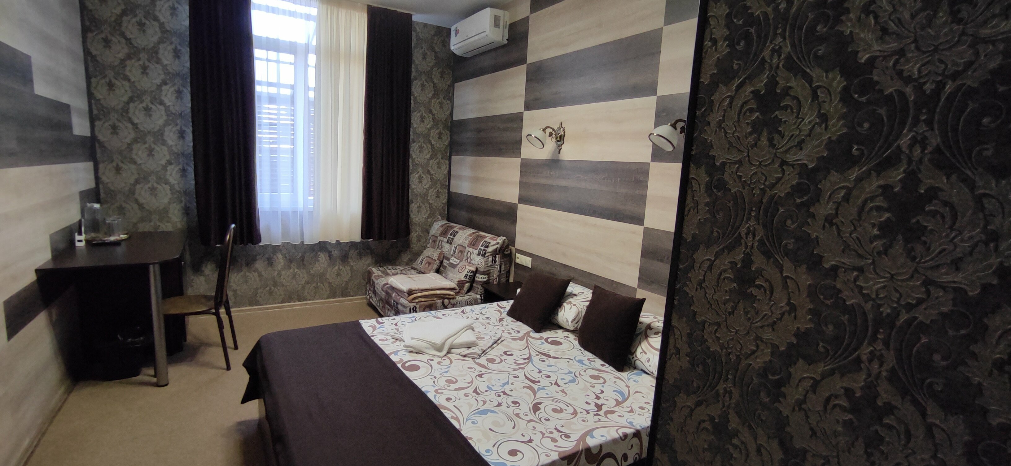 Трехместный номер Делюкс