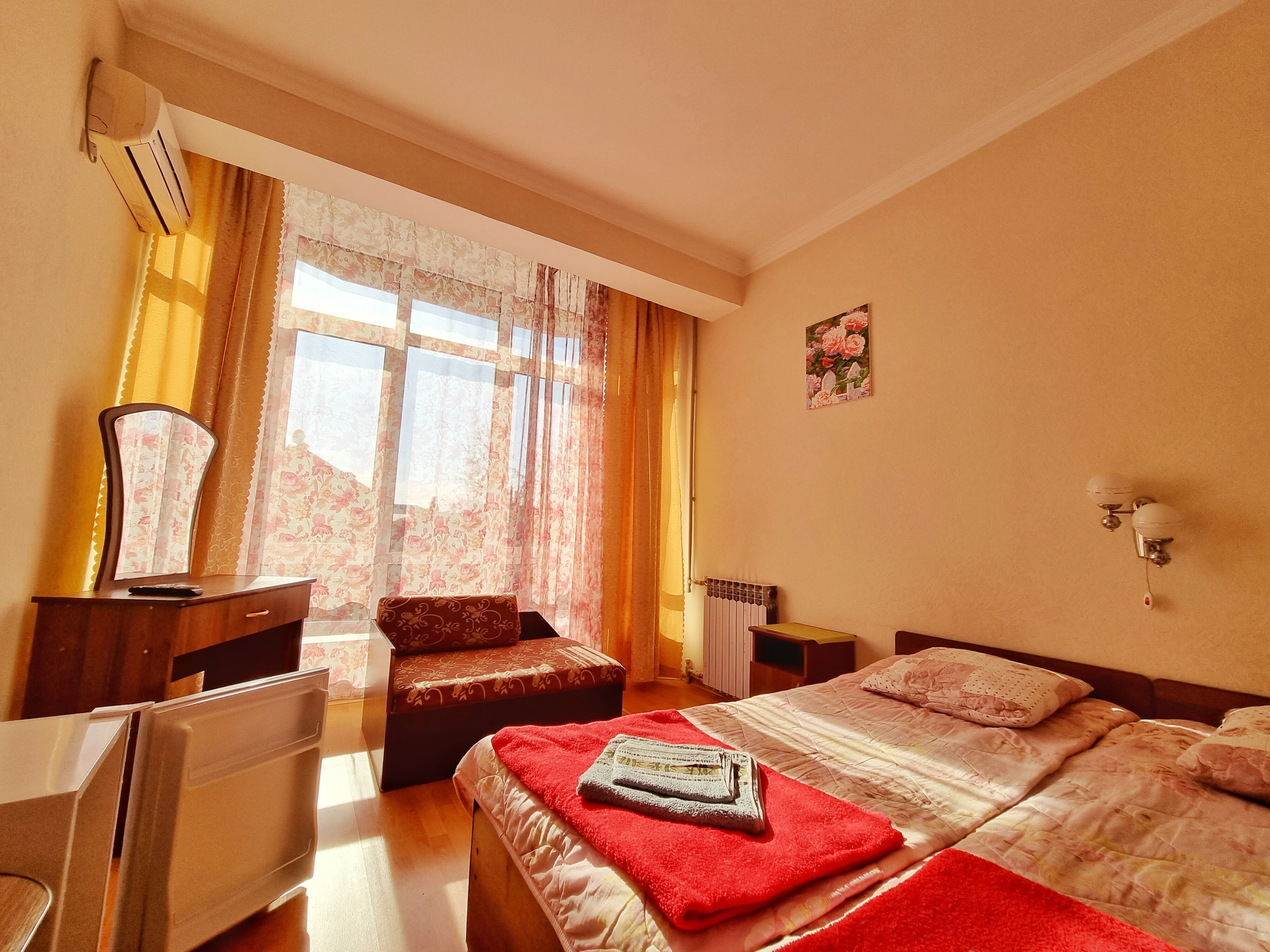 Двухместный номер эконом-класса с 2 отдельными кроватями