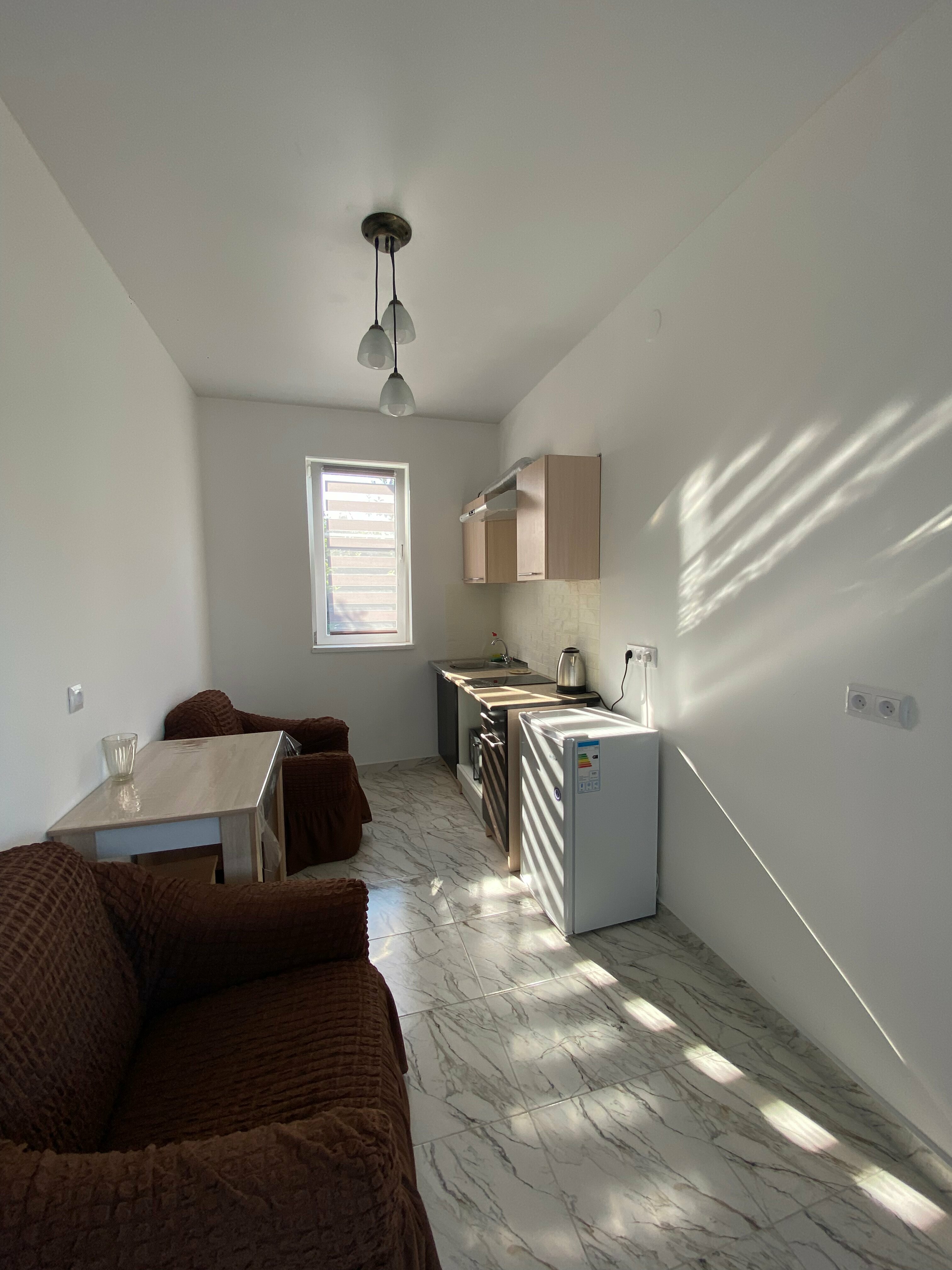 Номер-студия с кроватью размера "king-size" и диван-кроватью