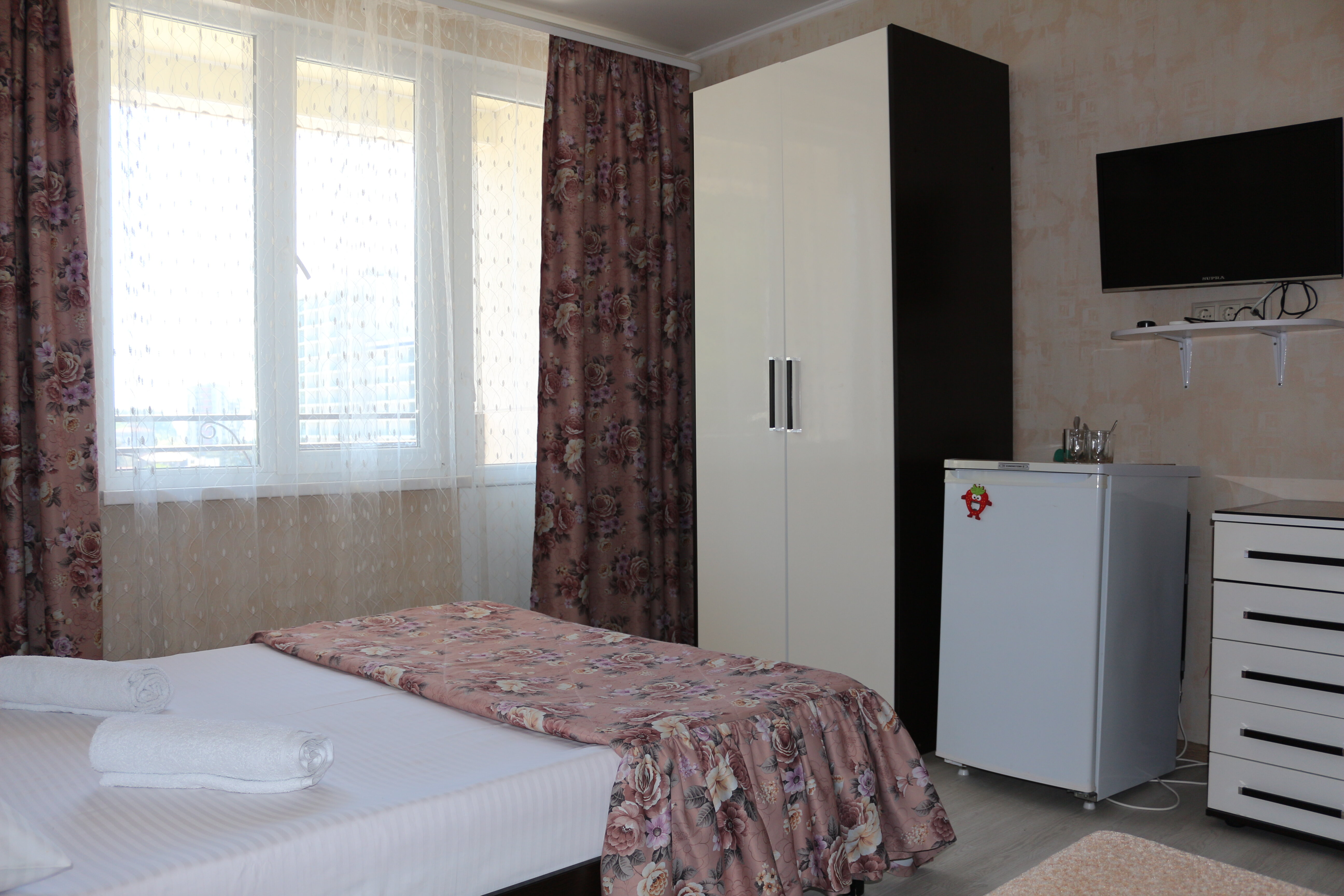 Трехместный номер с балконом