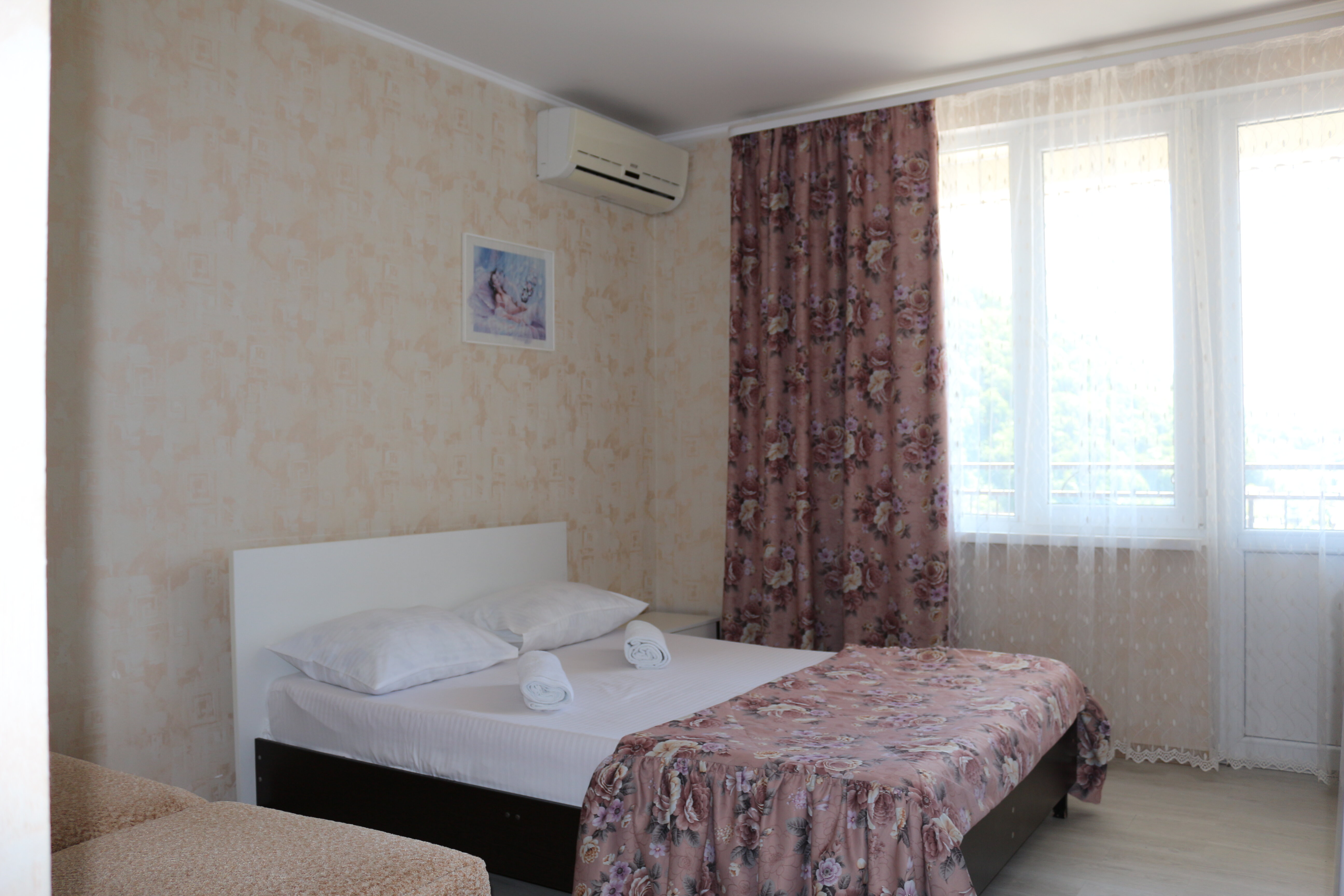 Трехместный номер с балконом