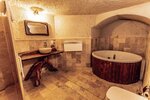 Двухместный люкс двуспальная кровать в Apex Cave Hotel