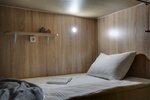 Кровать в 8-и местном общем номере повышенной комфортности в Roomy Hostel