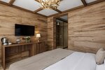 Делюкс с балконом и видом на горы в Stellar Collection Chalet, Krasnaya Polyana