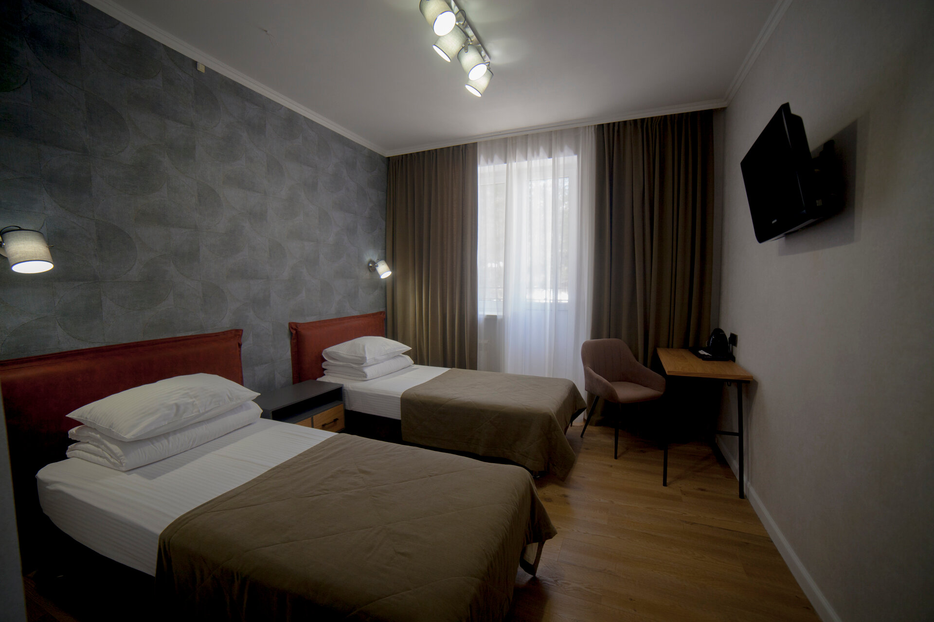 Двухместный номер с 2 отдельными кроватями и балконом