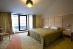 4 	Двухместный номер с двуспальной кроватью или c 2 односпальными кроватями и балконом в Невская Панорама