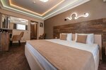 Номер Делюкс с кроватью размера «king-size» в Dragon SPA 16+