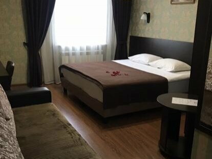 Трехместный номер Делюкс