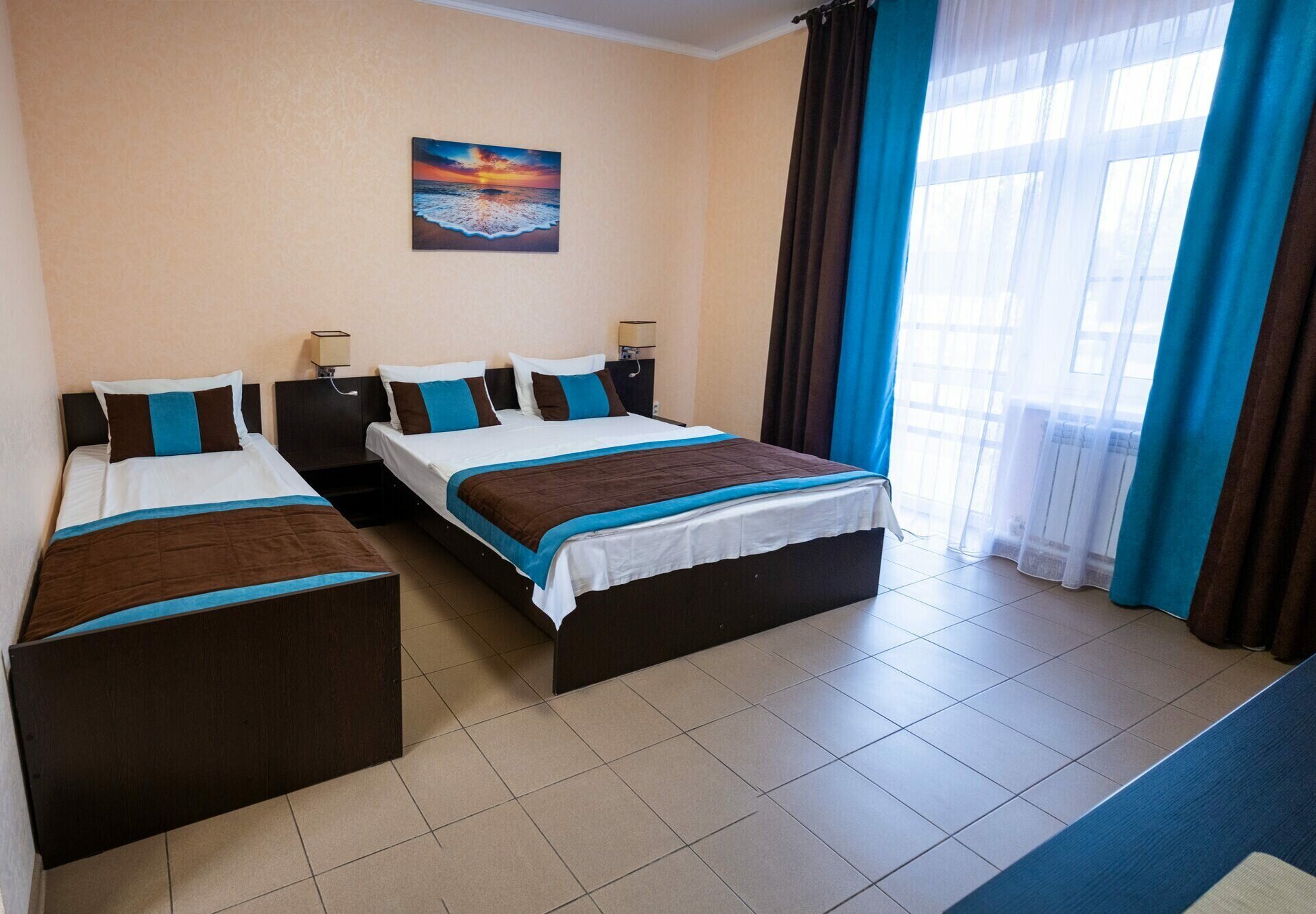 Трехместный номер Делюкс