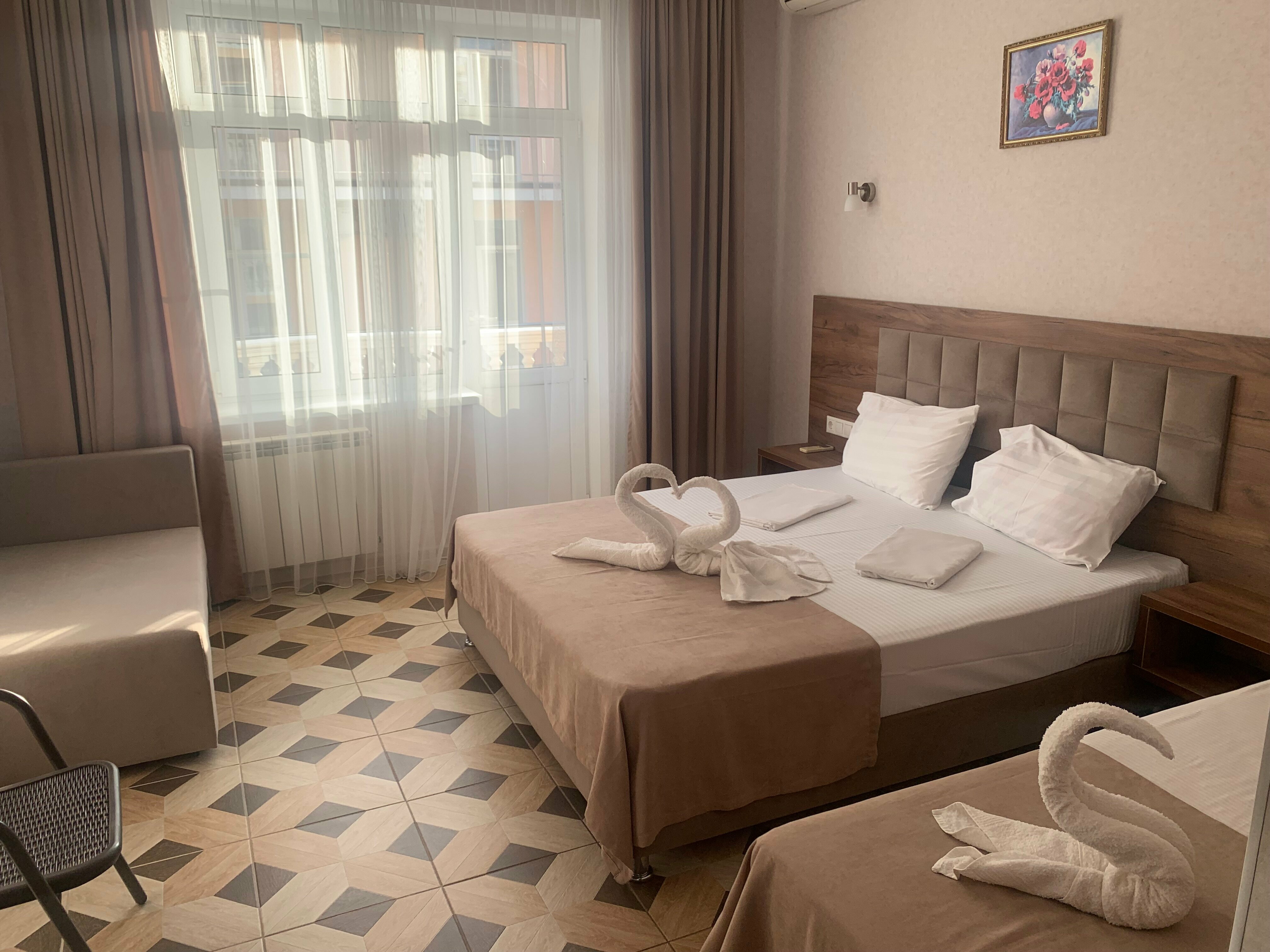 Четырехместный номер Делюкс