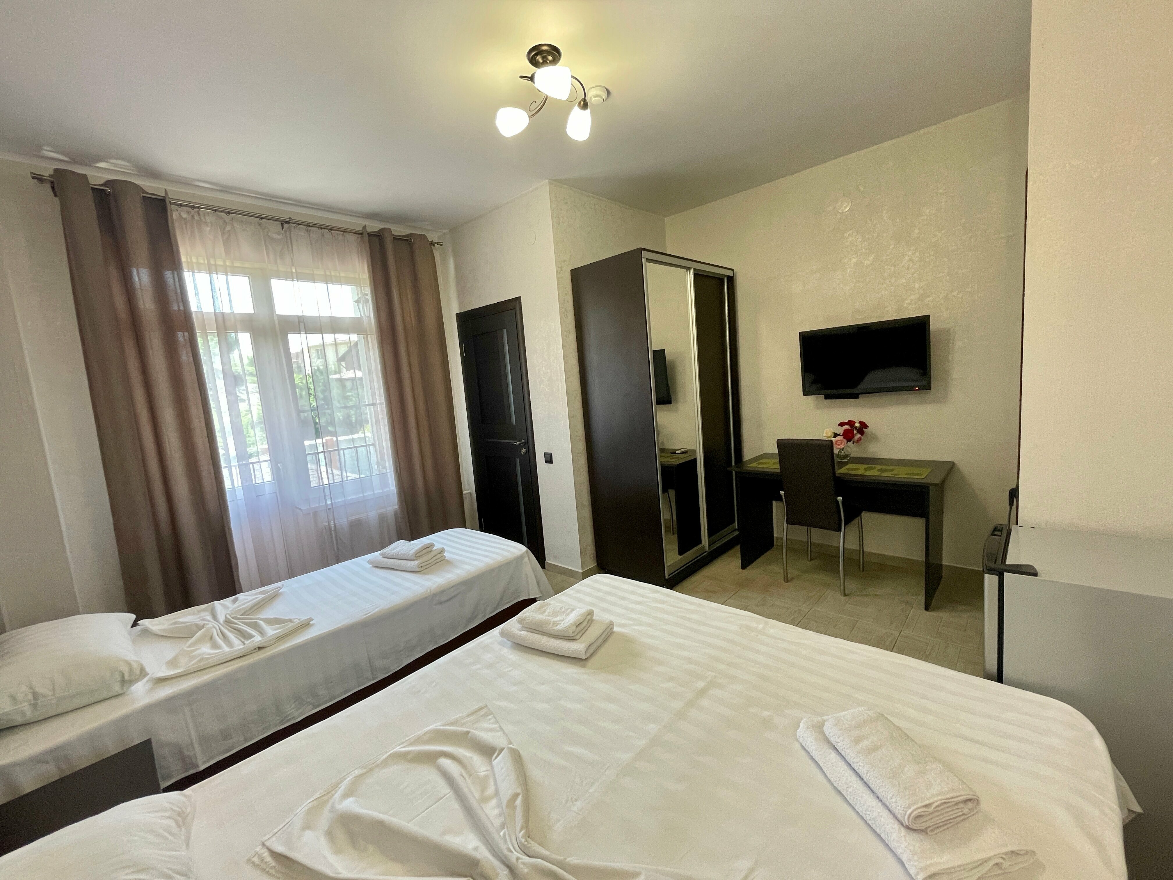 Трехместный номер Делюкс