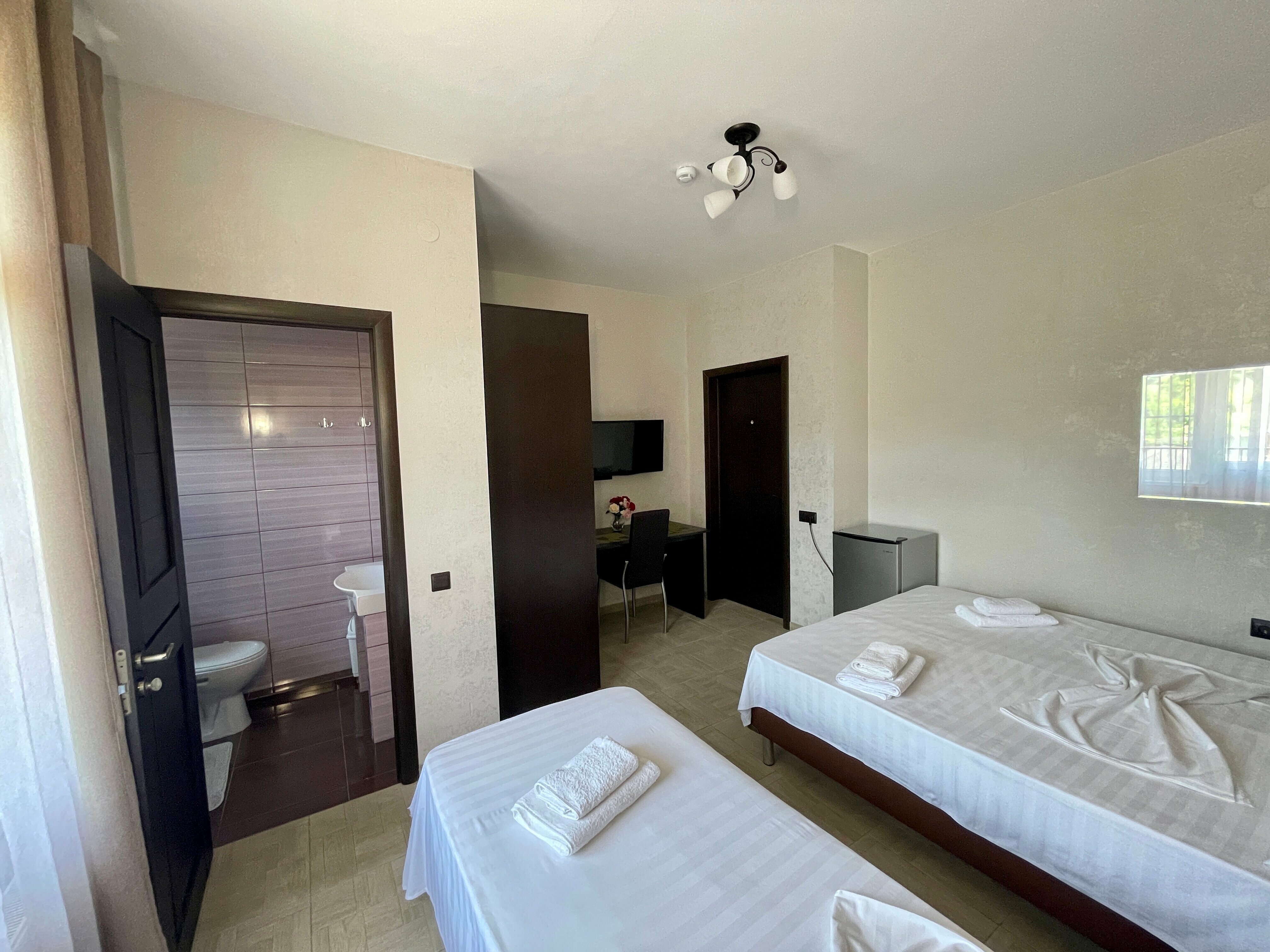 Трехместный номер Делюкс