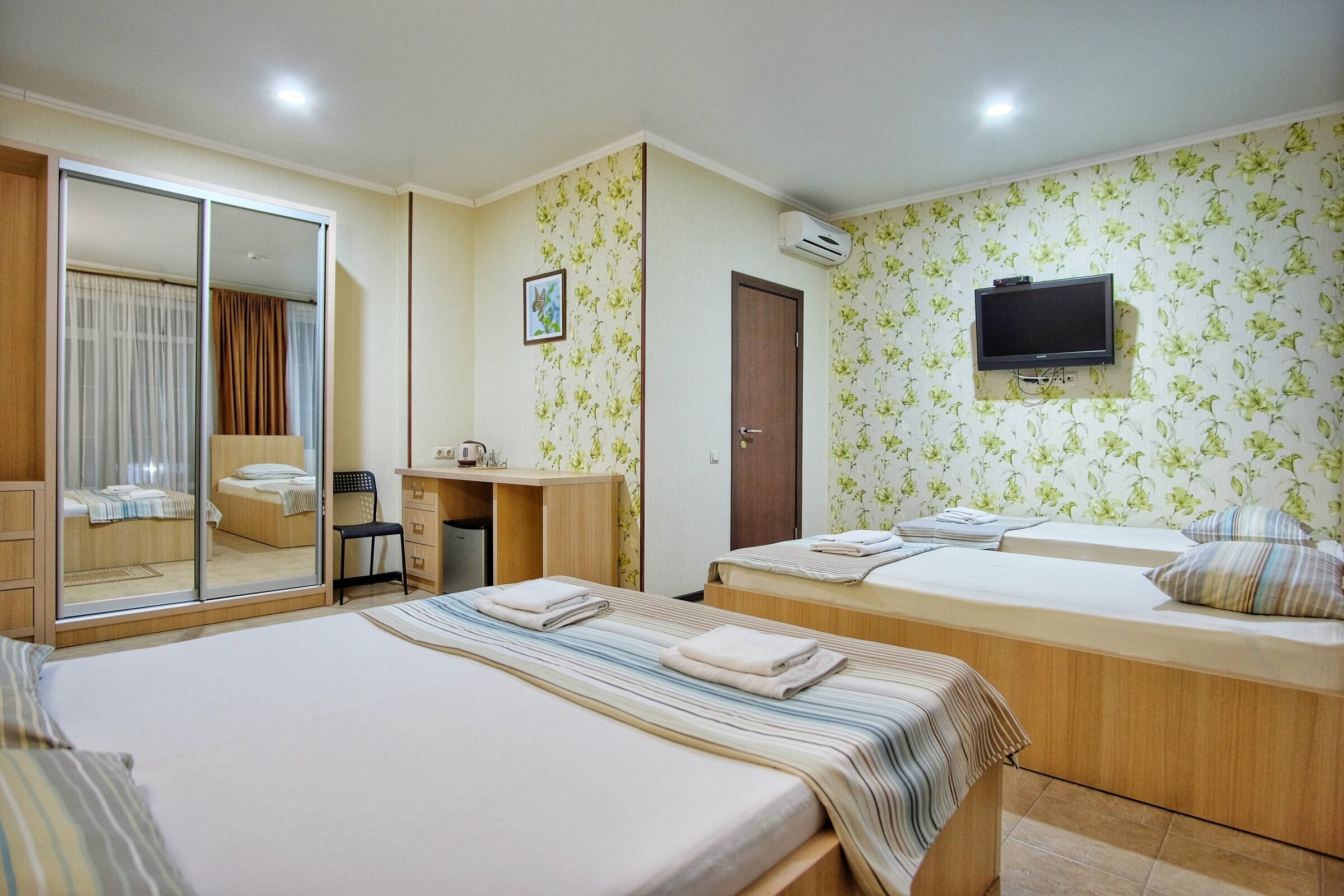 Улучшенный четырехместный номер