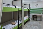 Койко-место в Мужском 8-ми местном номере в Compass Hostel