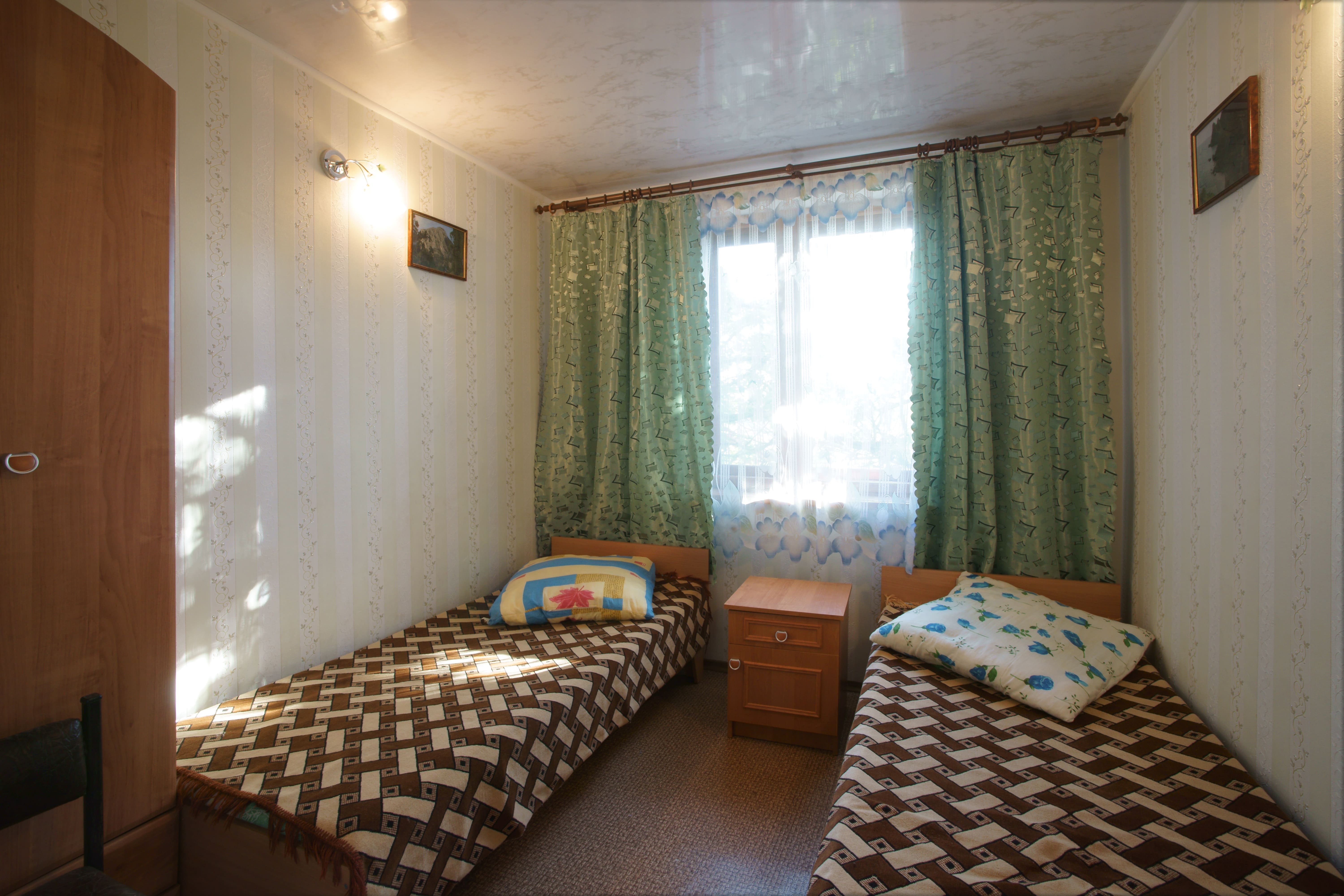 Двухместный номер эконом-класса с 2 отдельными кроватями