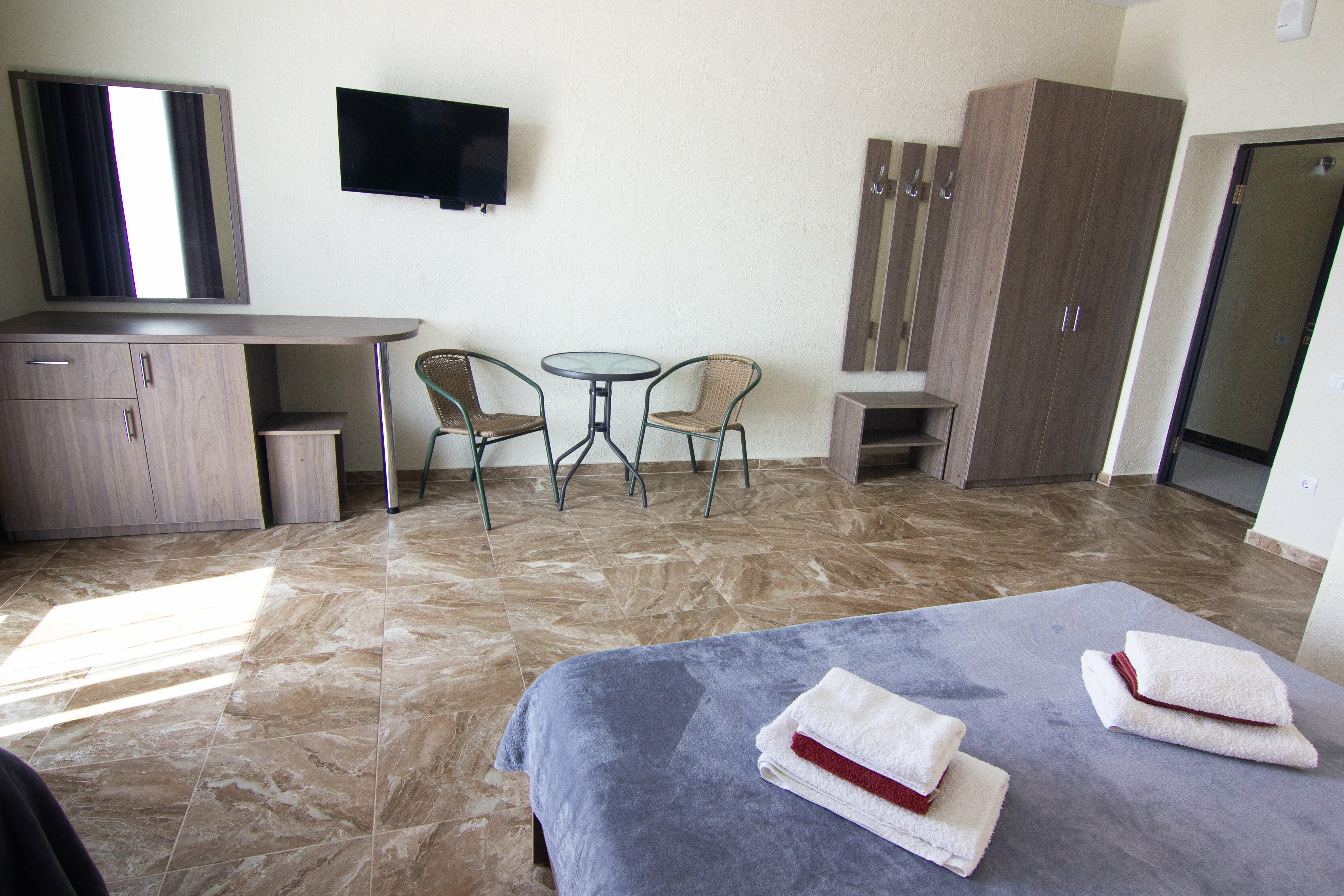 Трехместный номер с балконом